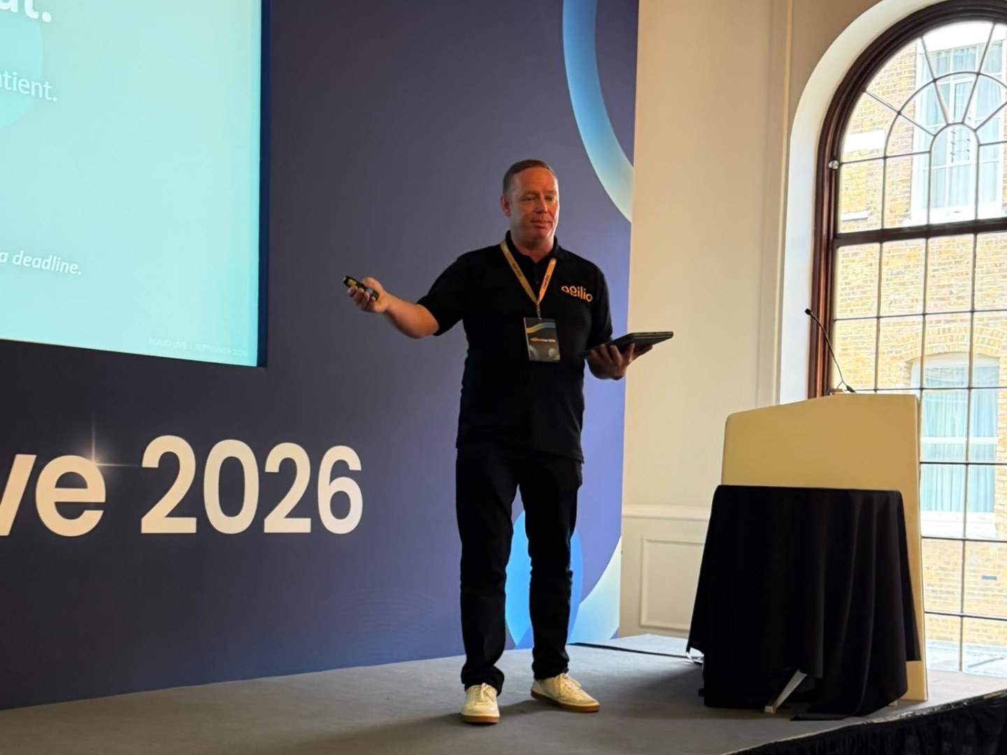 Andy Sloan delivering a keynote at Agilio Live 2026